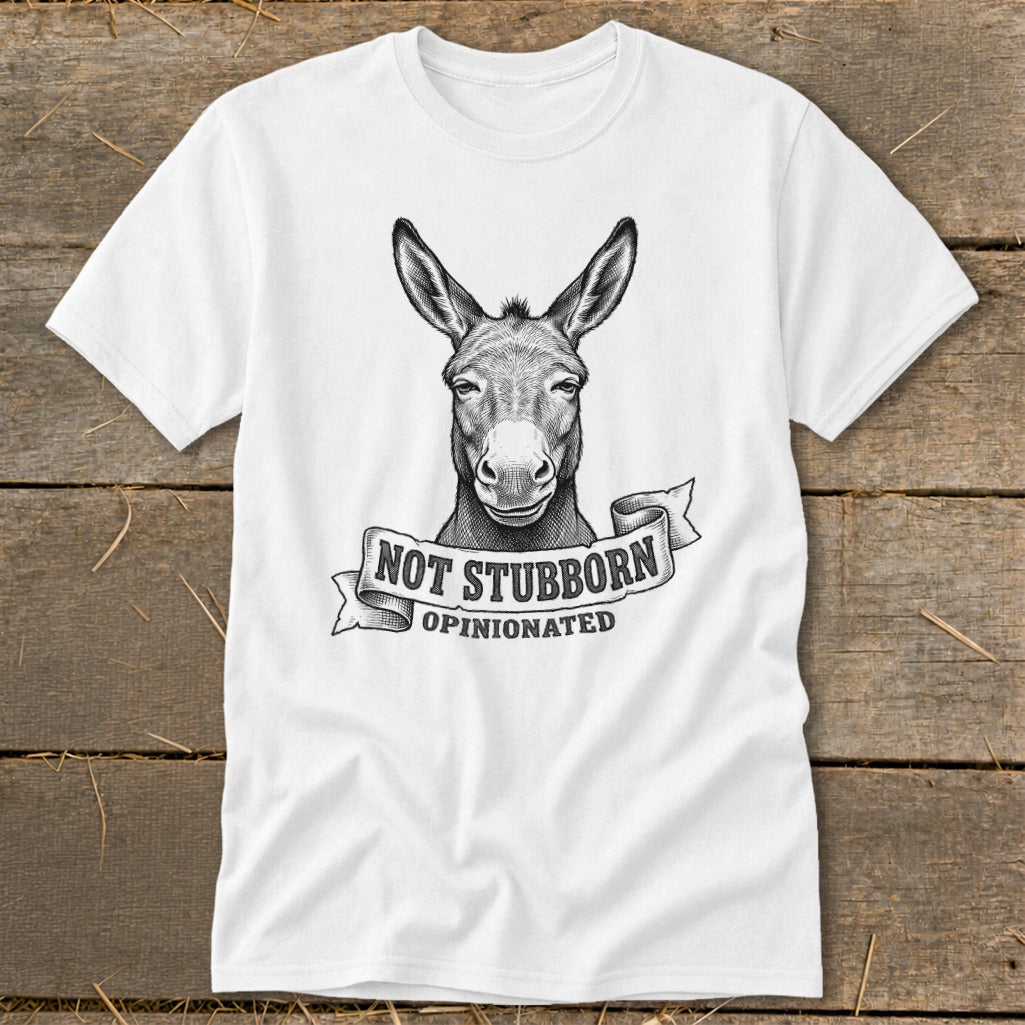 White t-shirt with sketch of a donkey head and banner that reads "NOT STUBBORN OPINIONATED".