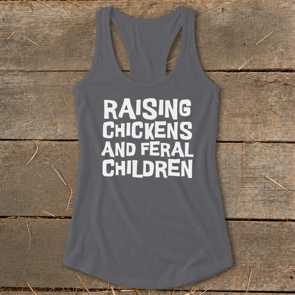 Dark gray tank top with white text reading "RAISING CHICKENS AND FERAL CHILDREN".