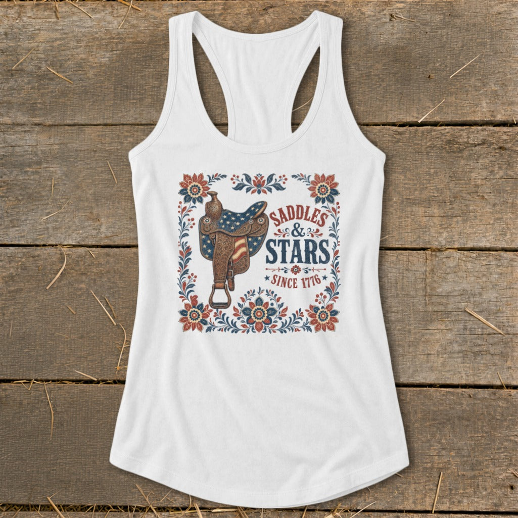 White tank top with "Saddles & Stars Since 1776" graphic and western saddle.