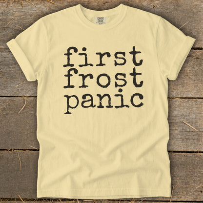 Light yellow t-shirt with black text "first frost panic".