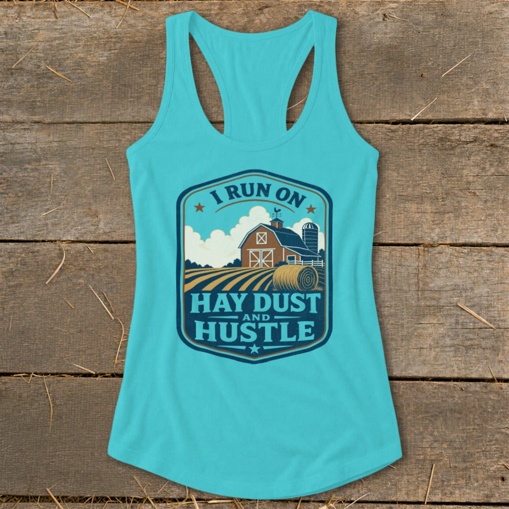Turquoise tank top with "I Run On Hay Dust and Hustle" farm graphic.