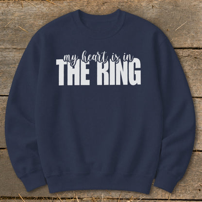 Navy sweatshirt with white text reading "my heart is in THE RING".
