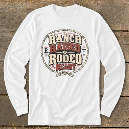 White long-sleeve shirt with "Ranch Raised Rodeo Ready" graphic.