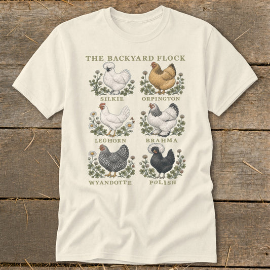 The Backyard Flock t-shirt displays six chicken breeds: Silkie, Orpington, Leghorn, Brahma, Wyandotte, and Polish.