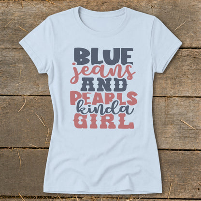 Light blue t-shirt with "BLUE jeans AND PEARLS kinda GIRL" graphic text.