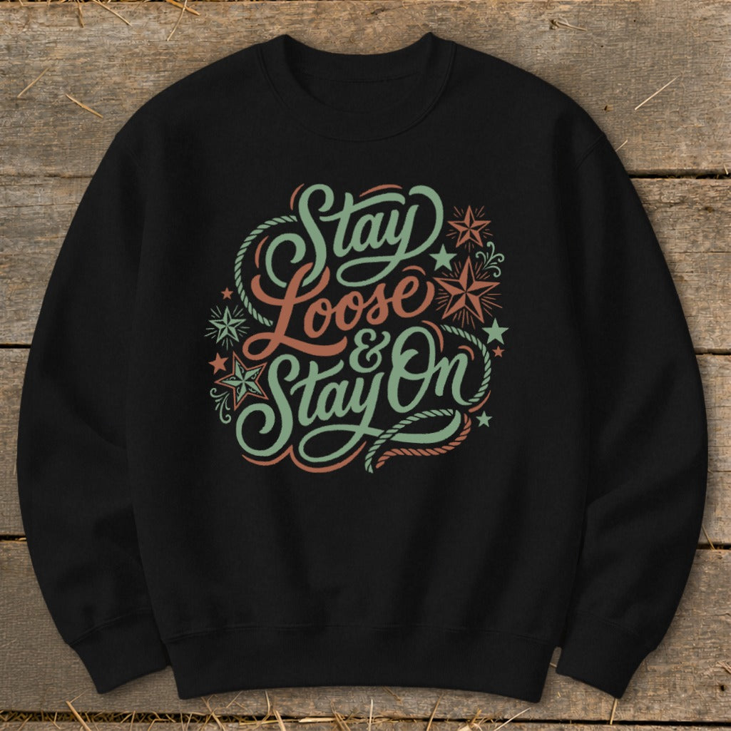 Black sweatshirt with "Stay Loose & Stay On" text and star graphics.