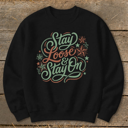 Black sweatshirt with "Stay Loose & Stay On" text and star graphics.