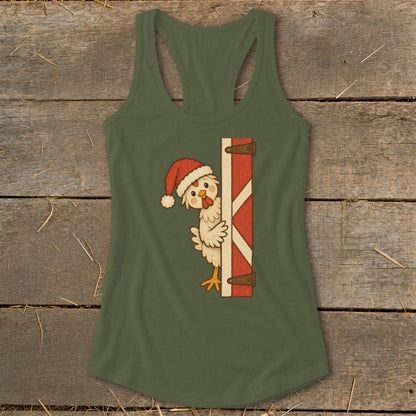 Green tank top with cartoon chicken wearing Santa hat peeking from barn door.