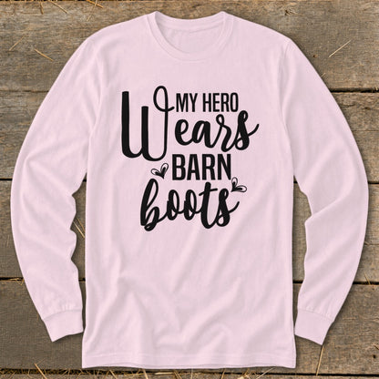 Pink long-sleeve shirt with text "My Hero Wears Barn Boots".