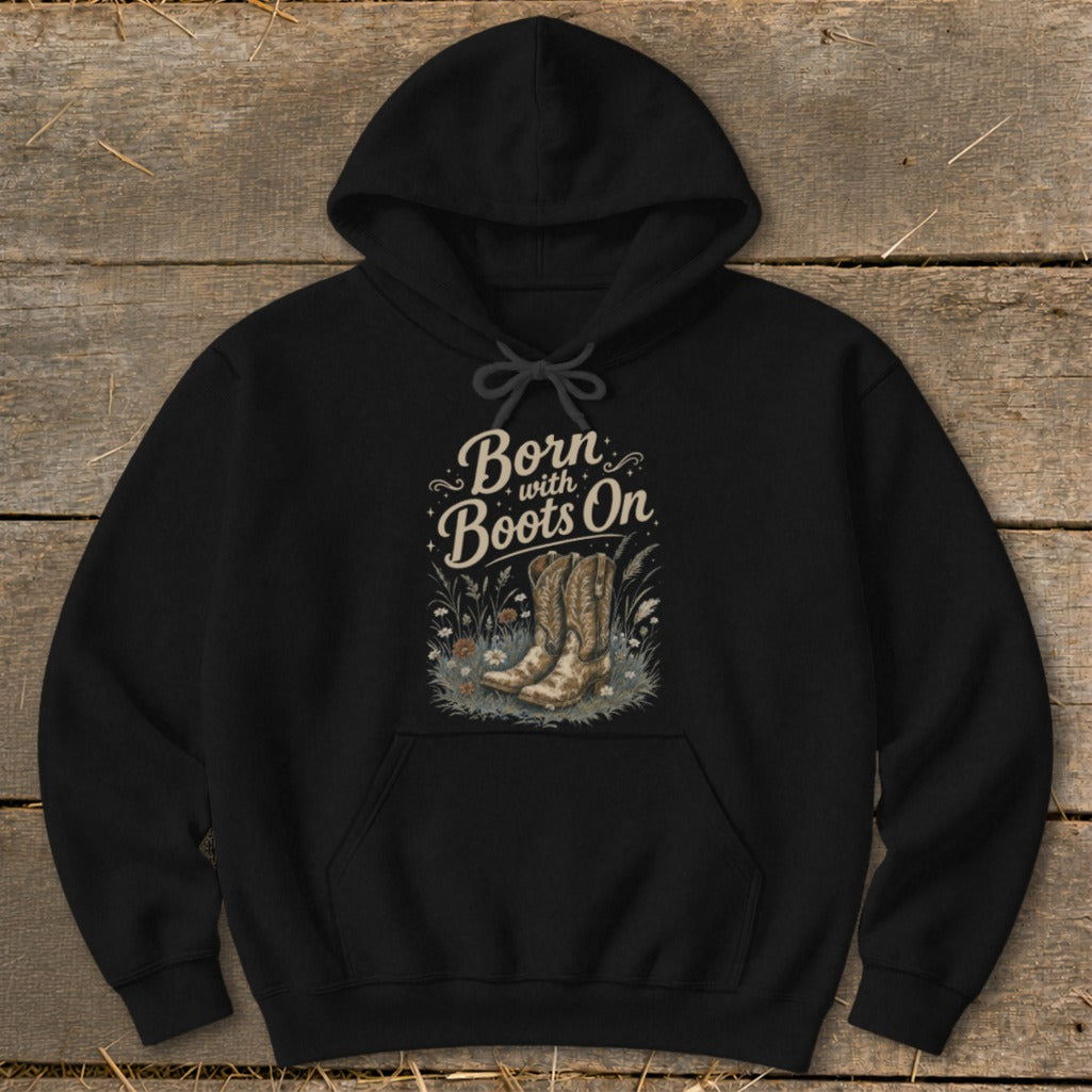 Black hoodie with "Born with Boots On" text and cowboy boots graphic.