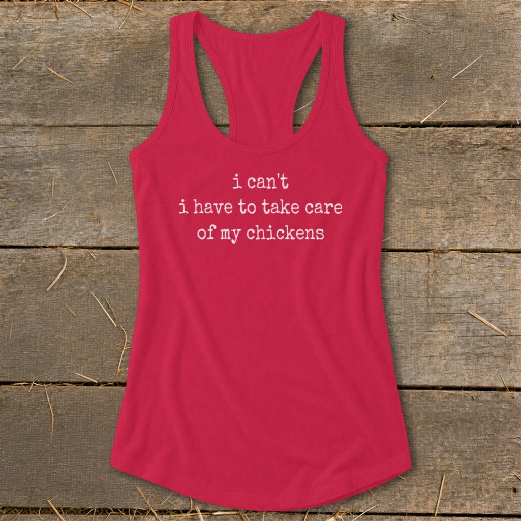Red racerback tank top with white text that reads "i can't i have to take care of my chickens."