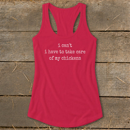 Red racerback tank top with white text that reads "i can't i have to take care of my chickens."