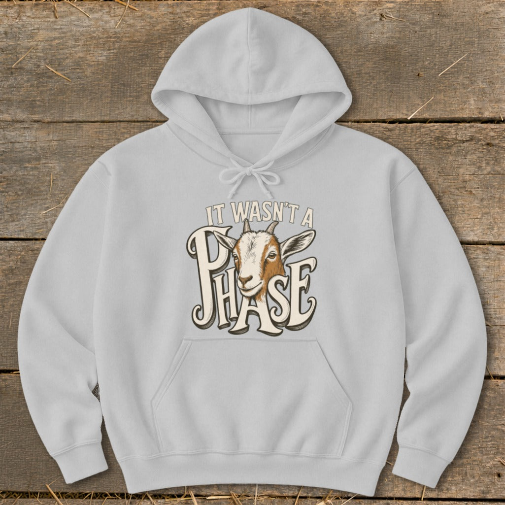 Light grey hoodie with a goat graphic and the text "IT WASN'T A PHASE".