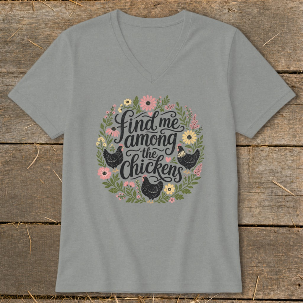 Gray v-neck t-shirt with floral circle featuring "find me among the chickens" text and chickens.