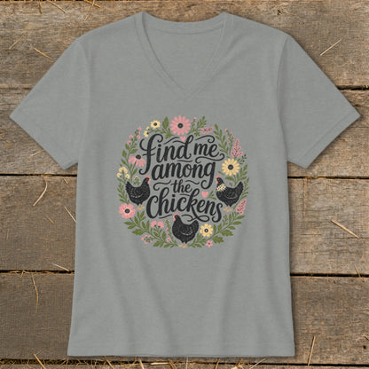 Gray v-neck t-shirt with floral circle featuring "find me among the chickens" text and chickens.