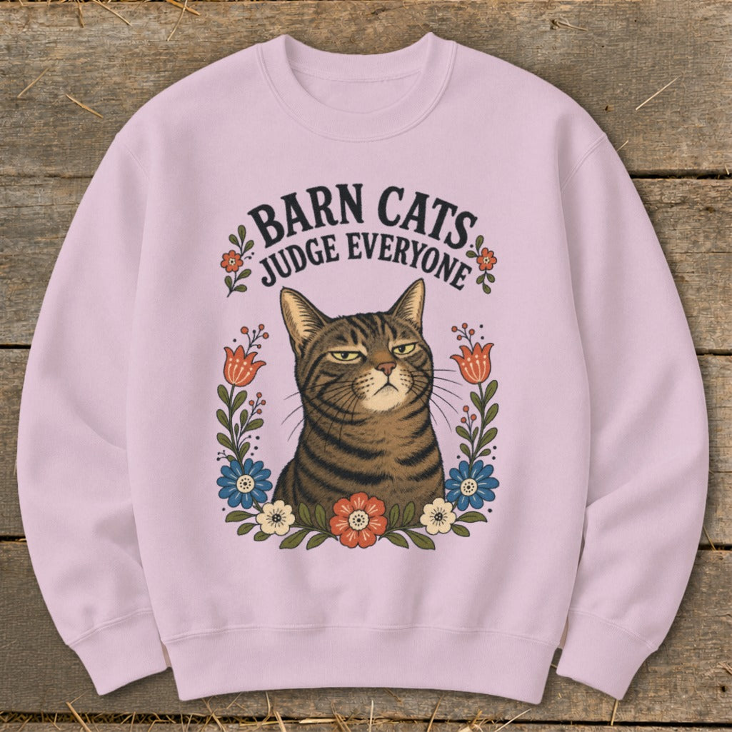 Pink sweatshirt with "Barn Cats Judge Everyone" text and a cat surrounded by flowers.