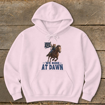Pink hoodie with graphic of cat riding horse holding Indianapolis Colts flag and text "WE RIDE AT DAWN."