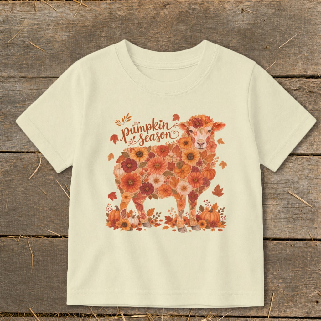 Cream t-shirt with floral sheep graphic and "pumpkin season" text.