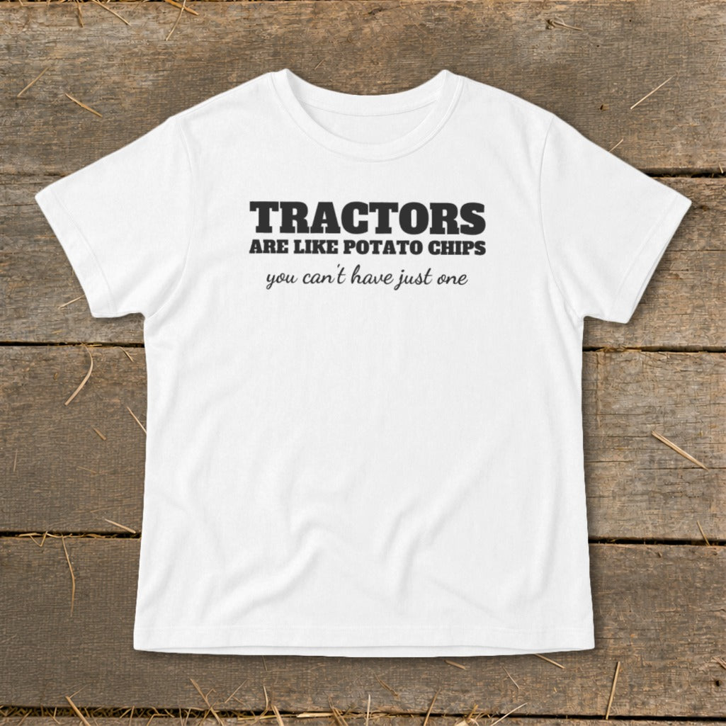 White t-shirt with black text "TRACTORS ARE LIKE POTATO CHIPS you can't have just one".