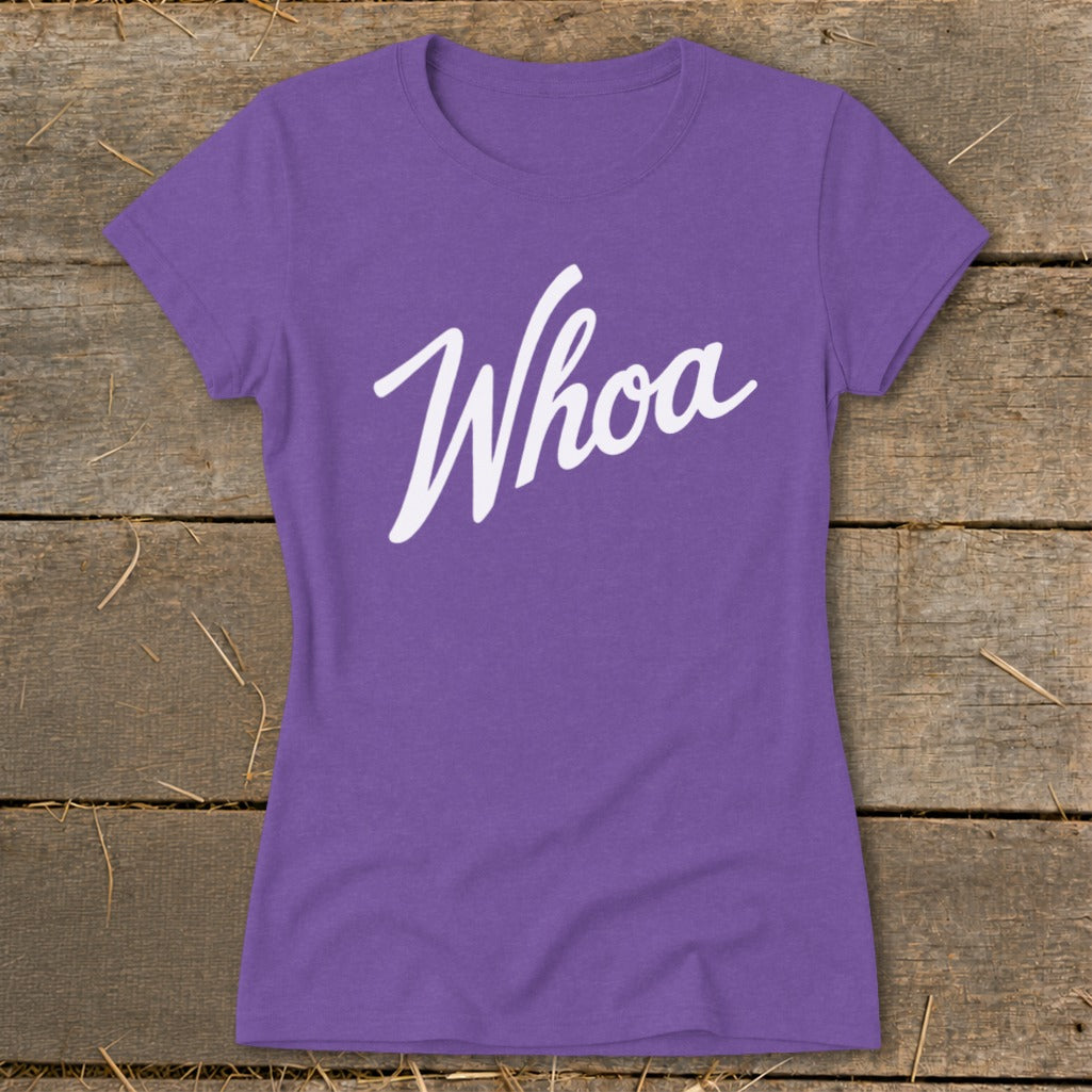 Purple t-shirt with white "Whoa" text in cursive font.