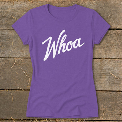 Purple t-shirt with white "Whoa" text in cursive font.