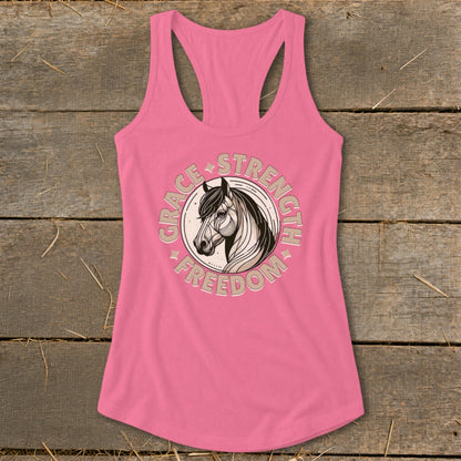Pink tank top with horse graphic and text "Grace, Strength, Freedom".