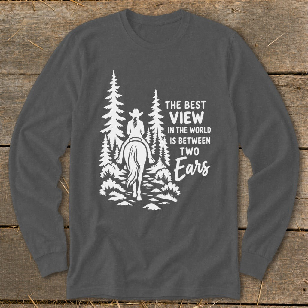 Dark grey long-sleeve t-shirt with a white graphic of a horseback rider and trees, and the text The Best View in the World is Between Two Ears.