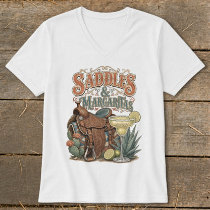 White t-shirt with "Saddles & Margaritas" graphic featuring a saddle and margarita.