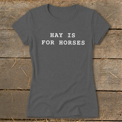Dark gray t-shirt with white text "HAY IS FOR HORSES".