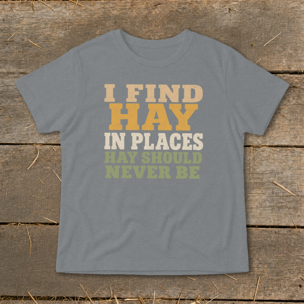 Grey t-shirt with text "I FIND HAY IN PLACES HAY SHOULD NEVER BE".
