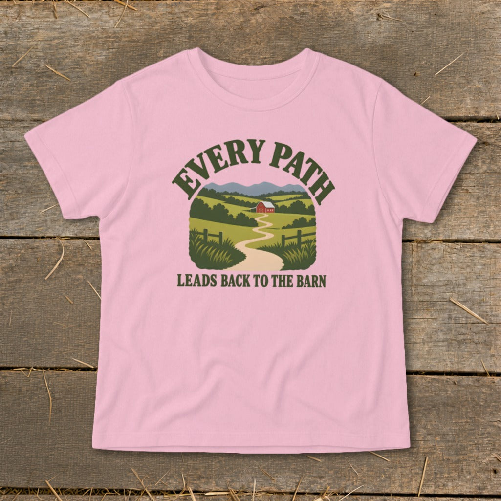 Pink t-shirt with graphic of winding path to a barn, text "EVERY PATH LEADS BACK TO THE BARN".