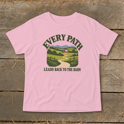 Pink t-shirt with graphic of winding path to a barn, text "EVERY PATH LEADS BACK TO THE BARN".