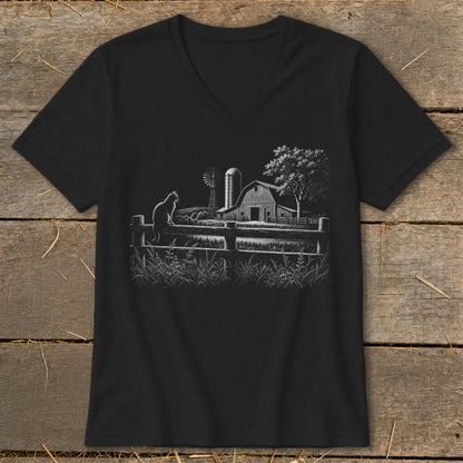 Black t-shirt with sketch of cat on fence, barn, windmill, and tree.