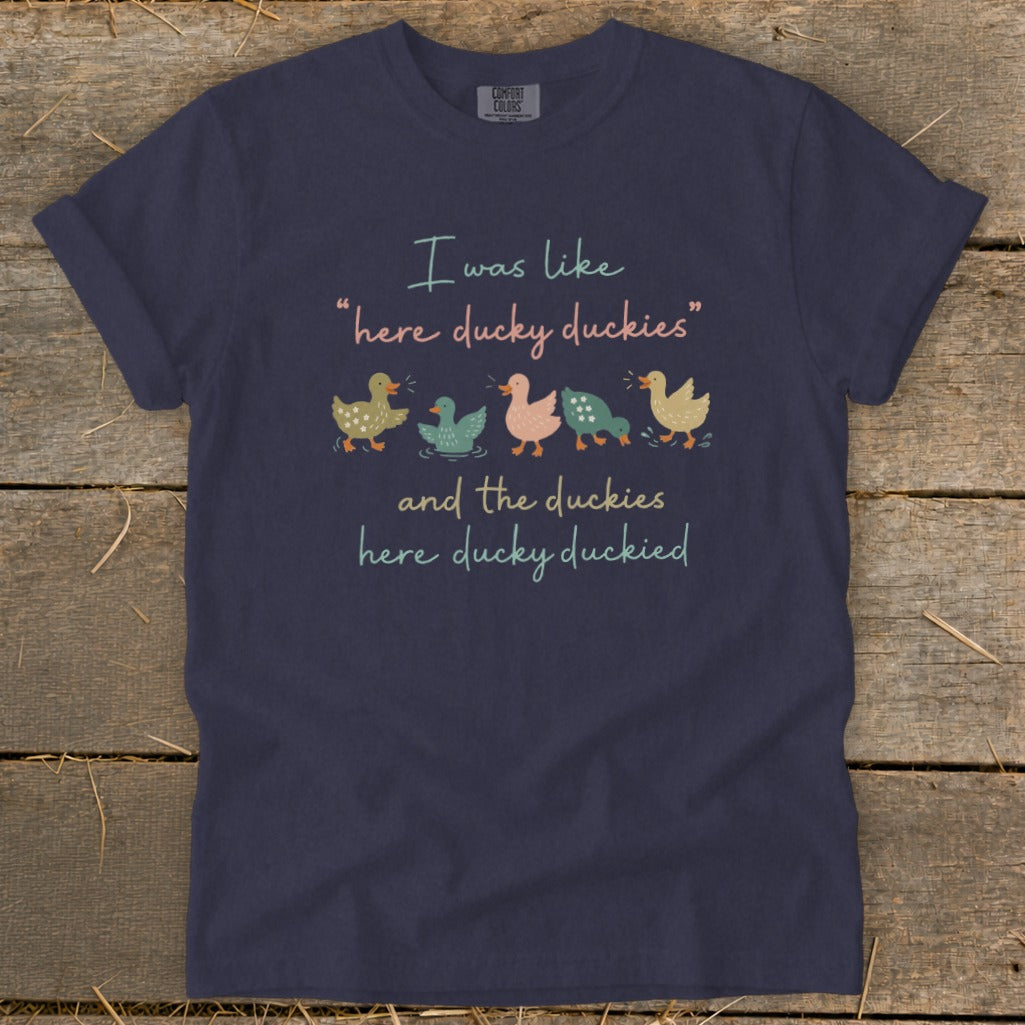 Navy t-shirt with "I was like 'here ducky duckies' and the duckies here ducky duckied" and ducks.