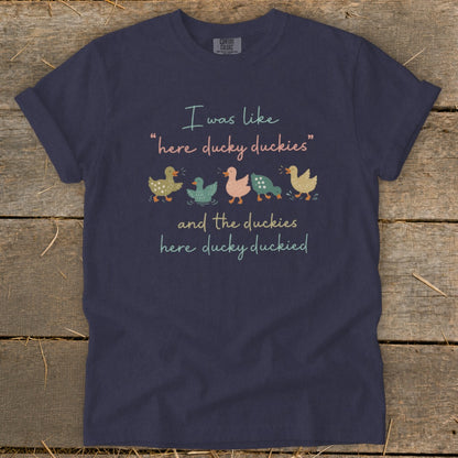 Navy t-shirt with "I was like 'here ducky duckies' and the duckies here ducky duckied" and ducks.