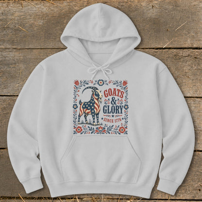 White hoodie with "Goats & Glory Since 1776" and a goat in American flag design.
