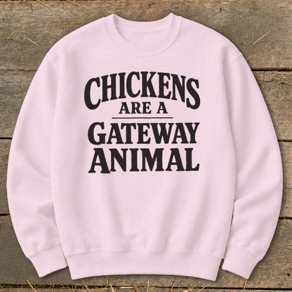 Pink crewneck sweatshirt with black text that reads "CHICKENS ARE A GATEWAY ANIMAL."