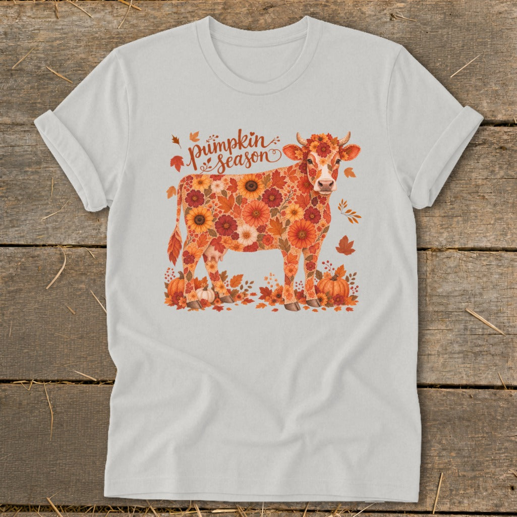 White t-shirt with a cow made of autumn flowers and pumpkins, saying "Pumpkin Season".