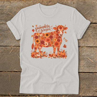 White t-shirt with a cow made of autumn flowers and pumpkins, saying "Pumpkin Season".