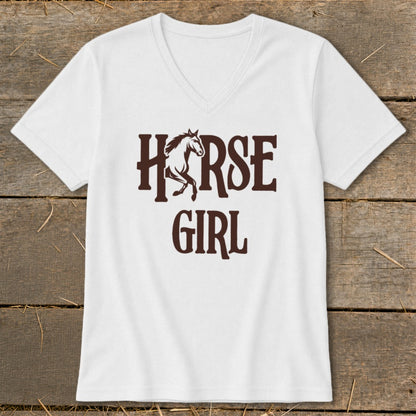 White v-neck t-shirt with brown "HORSE GIRL" text and a horse silhouette.