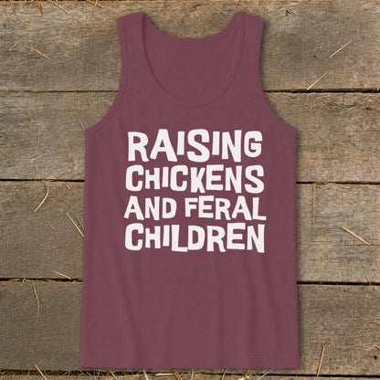 Burgundy tank top with white text: "Raising Chickens and Feral Children".
