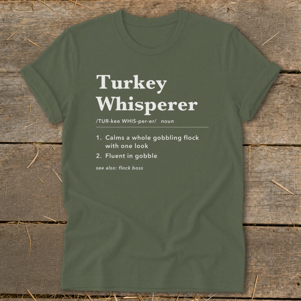 Green t-shirt with "Turkey Whisperer" definition.