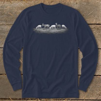 Five goats graze in a grassy field, depicted on a navy long-sleeved shirt.