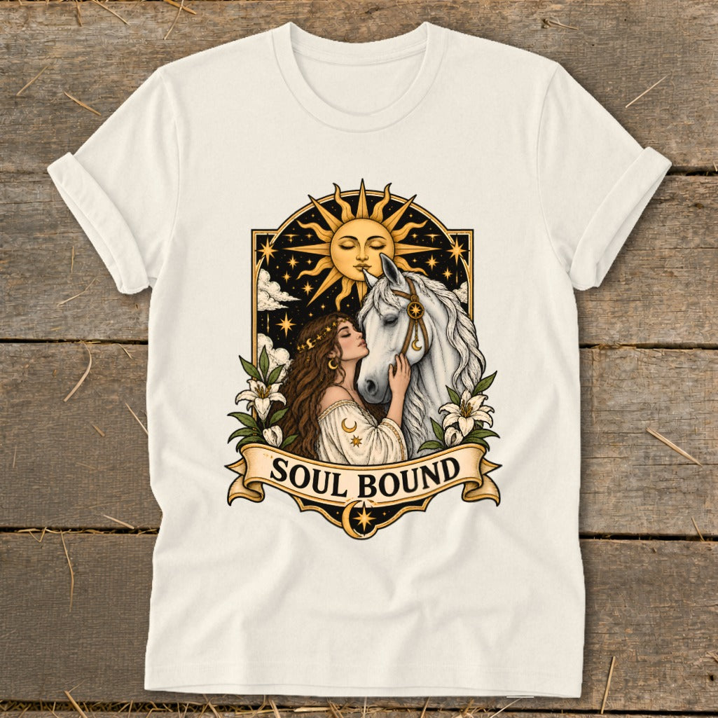 Woman embracing a white horse with sun and stars background, text SOUL BOUND.