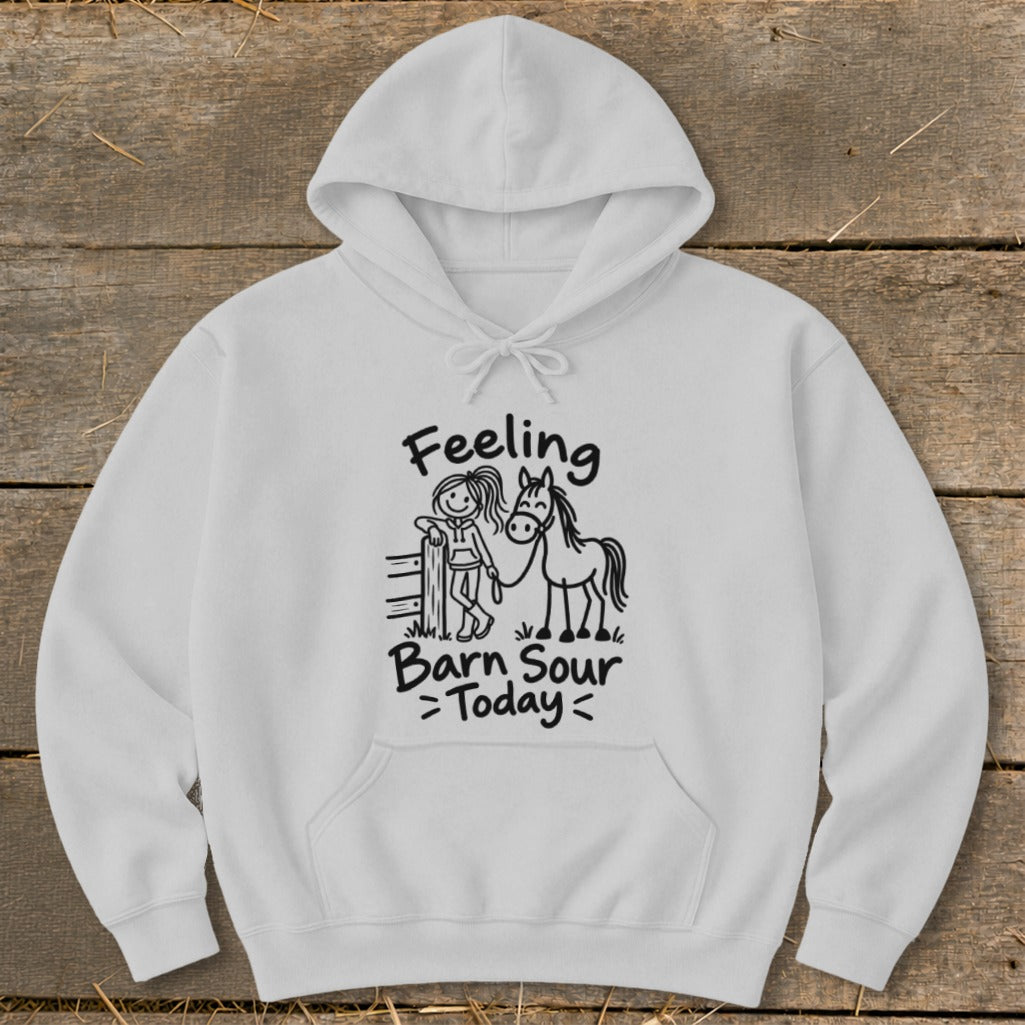White hoodie with a drawing of a girl and horse and text "Feeling Barn Sour Today".