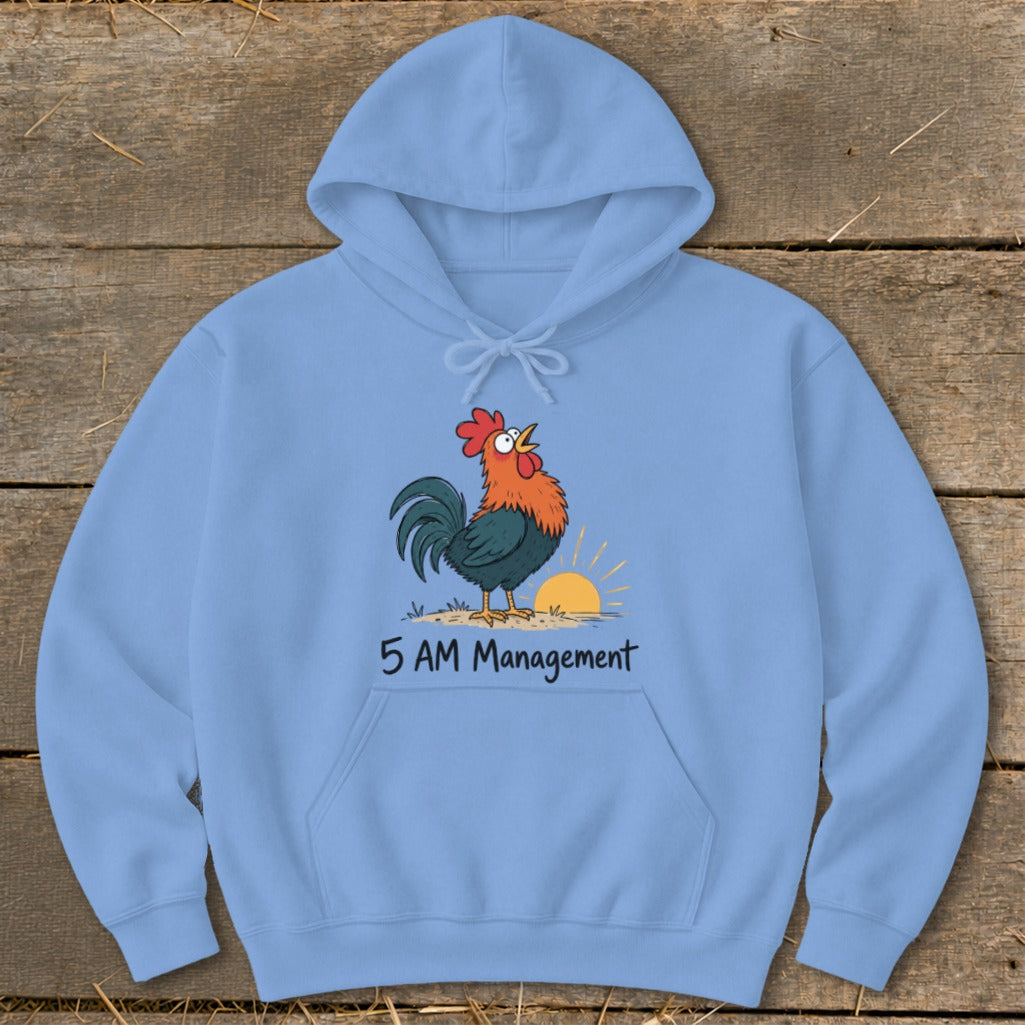 Light blue hoodie with cartoon rooster crowing at sunrise, text reads "5 AM Management".