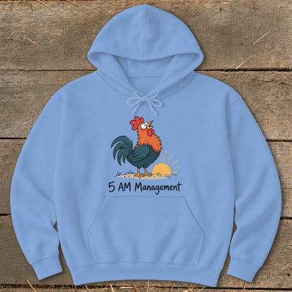 Light blue hoodie with cartoon rooster crowing at sunrise, text reads "5 AM Management".