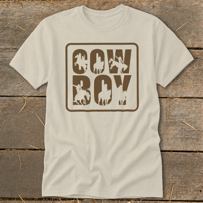 Cream t-shirt with brown "COW BOY" text featuring horse and rider silhouettes.