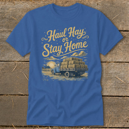 Blue t-shirt with "Haul Hay or Stay Home" text and a truck full of hay bales.