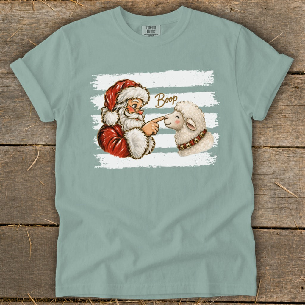Santa Claus boops a sheep with "Boop" written above.